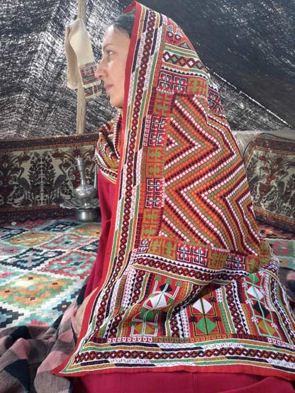 example of a nomadic woman wearing a Sangsari shawl